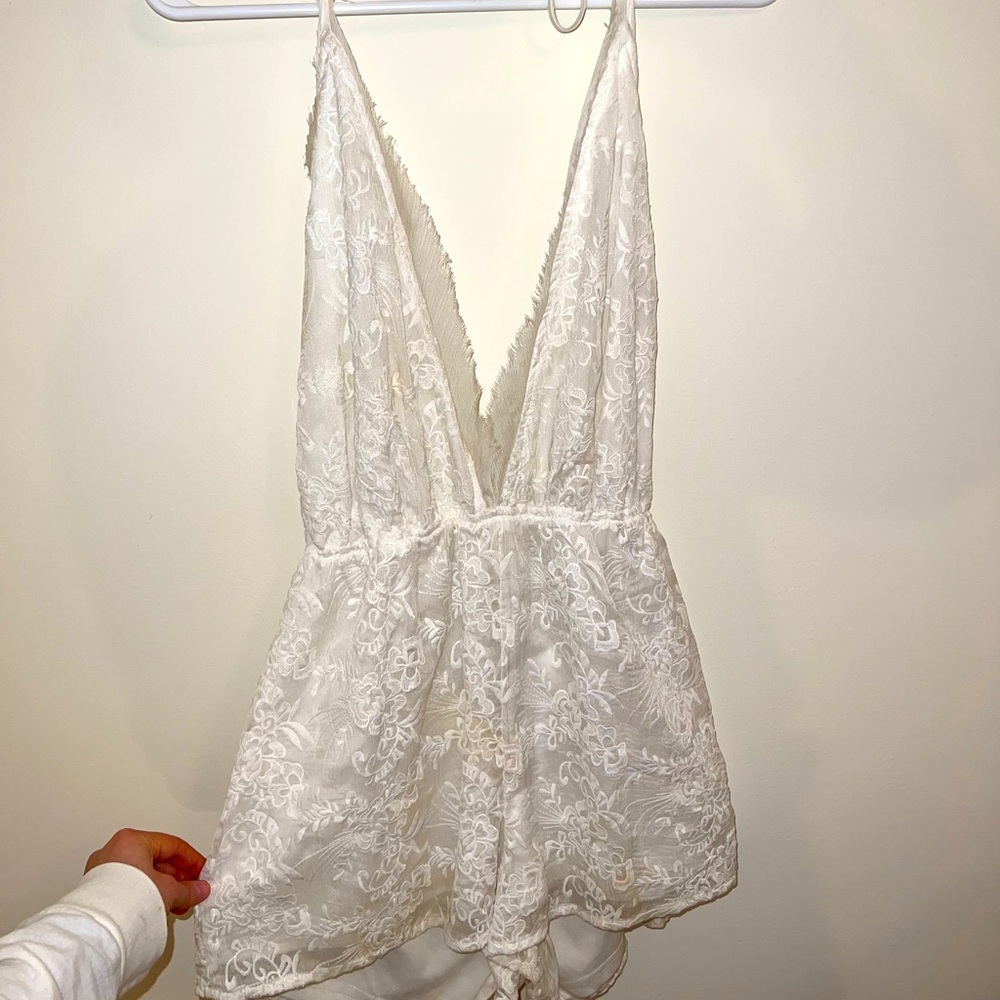 White lace romper, size medium.